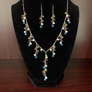 10 karat gold, semi precious stone and pearl necklace and earring set.